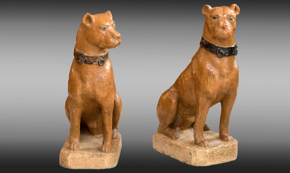 Pair of painted dogs <br/>made in reconstituted stone<br/> Nineteenth Century
