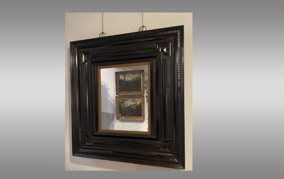 Excepcional espejo holandes <br/> en madera chapada y ebonizada <br/> Siglo XVII